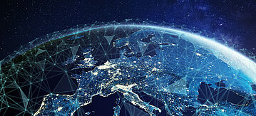 Eine Erdkugel auf der die Vernetzung Europas hervorgehoben ist.