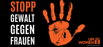 Orangene Hand mit Text "Stopp Gewalt an Frauen"