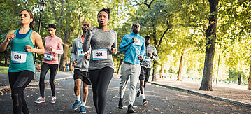 Laufgruppe in einem Park