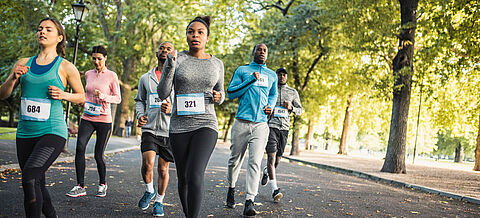 Laufgruppe in einem Park