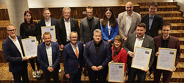Gruppenbild: Auszeichnung neuer Klimaschutz-Unternehmen