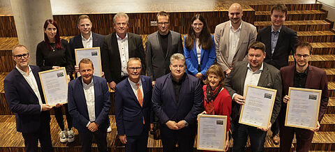 Gruppenbild: Auszeichnung neuer Klimaschutz-Unternehmen